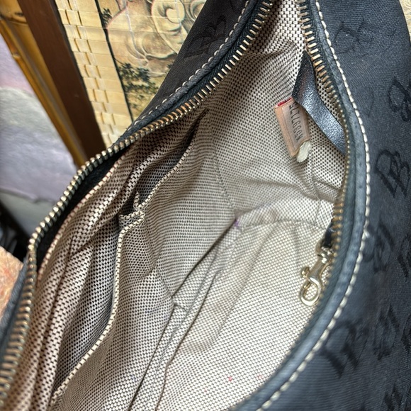 Dooney & Bourke Bucket Bag Black Signature Monogram 8”Lx5.5”W Center 5”H - Picture 15 of 17